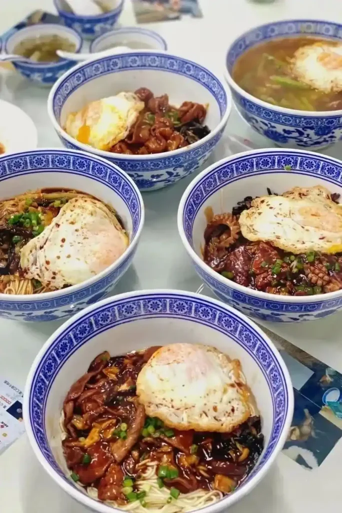 Clam and pork liver noodles at an old alleyway noodle shop in western Shanghai
