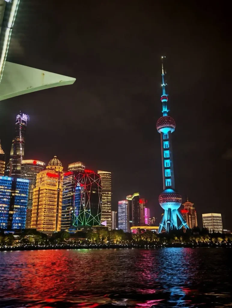 Night view of the Oriental Pearl Tower on the Bund in Shanghai, China